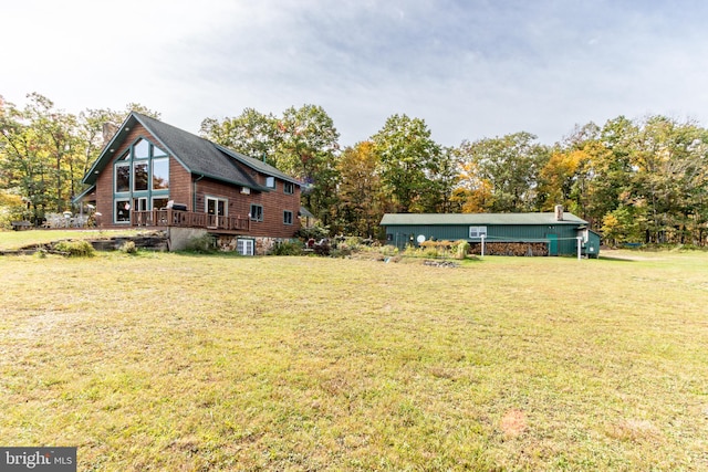 view of yard featuring a wooden deck