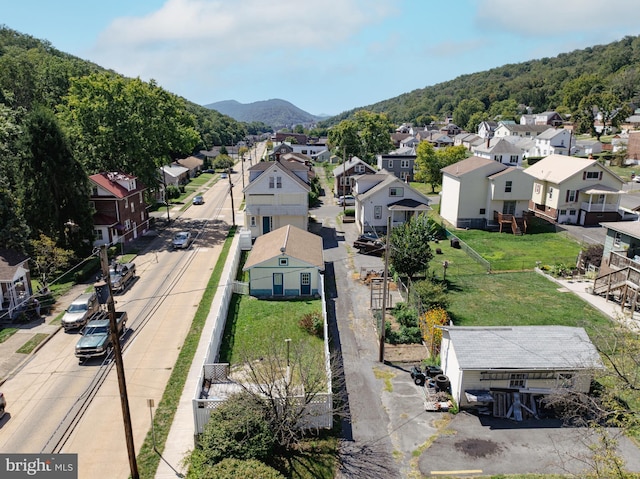 aerial view featuring a mountain view and a residential view