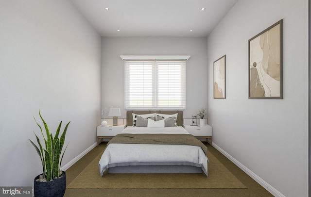 bedroom featuring recessed lighting and baseboards