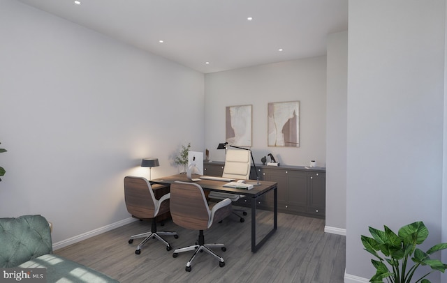 office area featuring recessed lighting, baseboards, and wood finished floors