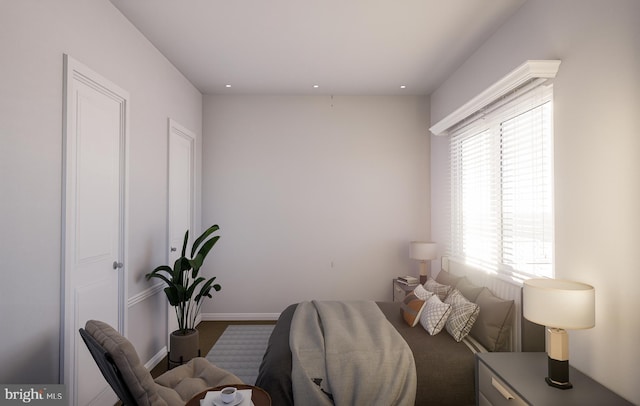 bedroom featuring recessed lighting and baseboards