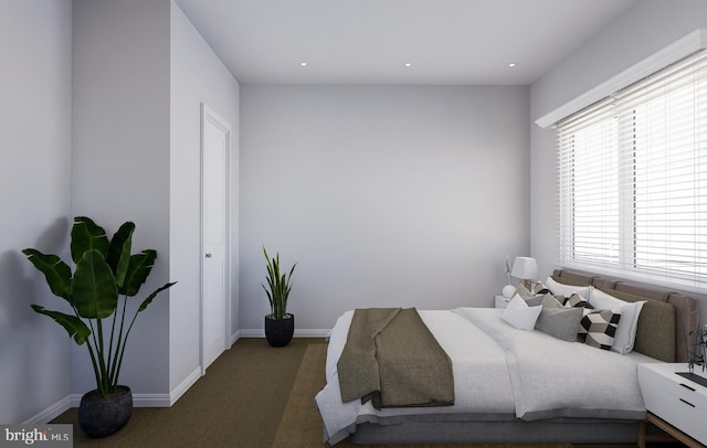 bedroom with carpet floors, baseboards, and recessed lighting