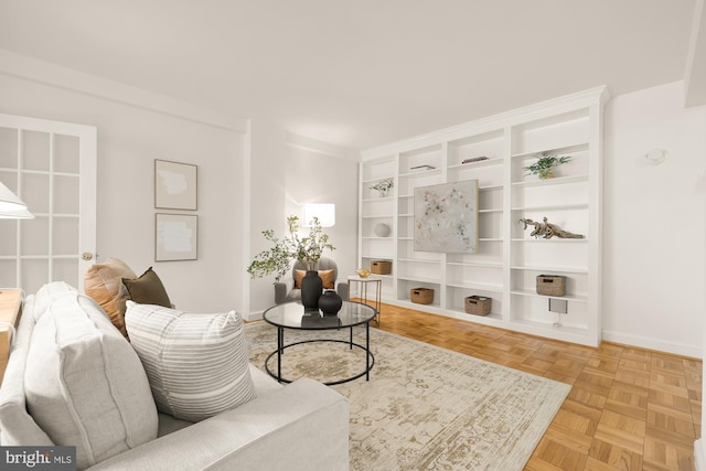 living room with light parquet floors