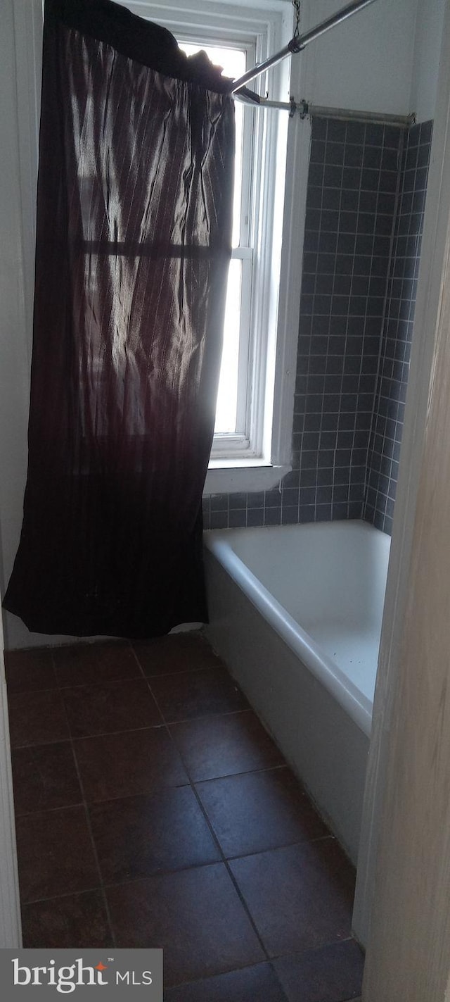 bathroom with tile patterned flooring