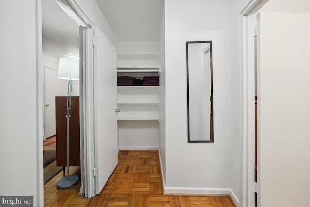 hallway with light parquet floors