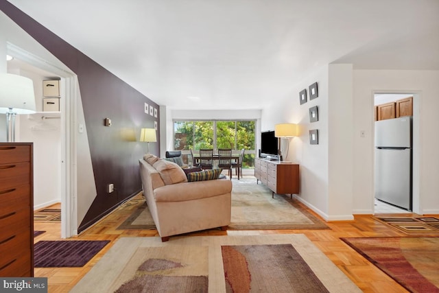 living room with light parquet flooring