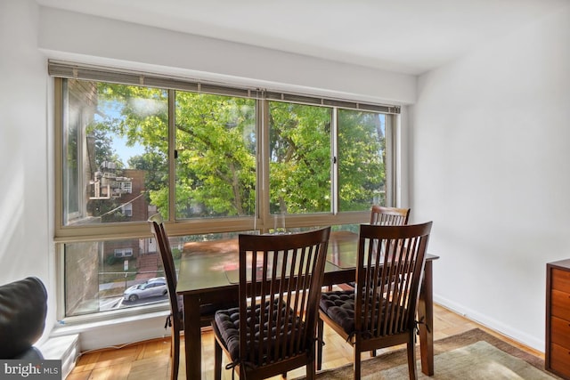 dining area with light parquet floors