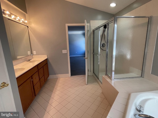 bathroom featuring separate shower and tub, tile patterned flooring, vanity, and lofted ceiling