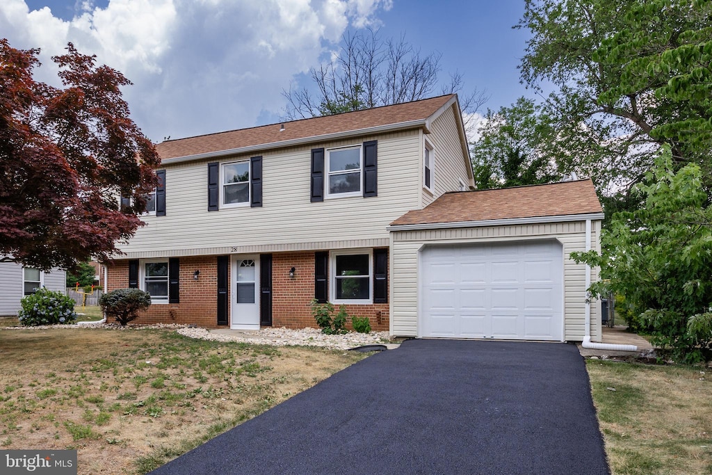 front of property featuring a garage