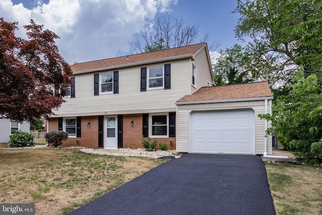 front of property featuring a garage