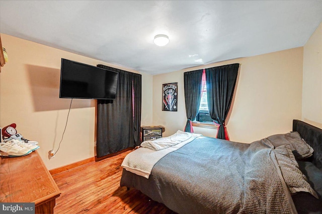 bedroom featuring light hardwood / wood-style floors