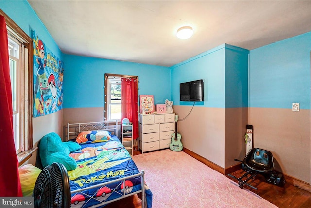 bedroom featuring hardwood / wood-style flooring