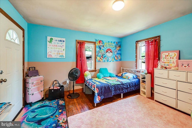 bedroom featuring wood-type flooring