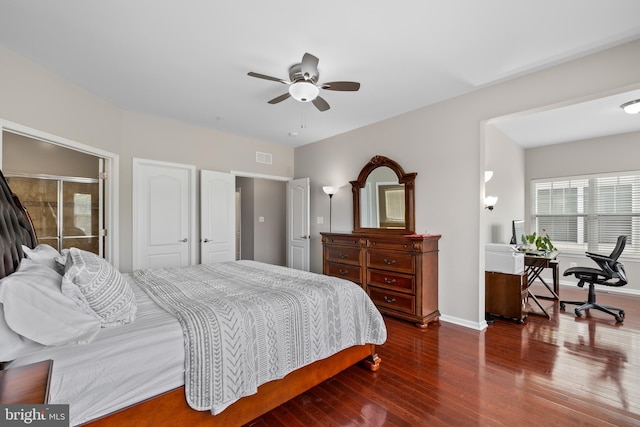 bedroom featuring visible vents, baseboards, ceiling fan, and wood finished floors