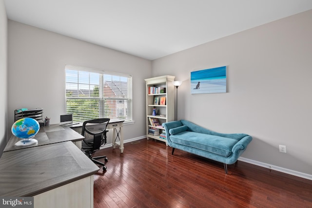 office space featuring dark wood-style flooring and baseboards
