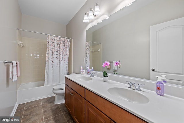 bathroom with shower / bath combination with curtain, a sink, toilet, and tile patterned floors