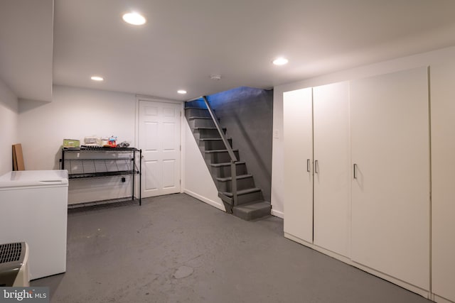 basement featuring refrigerator