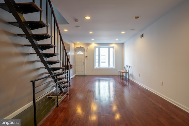 interior space with dark hardwood / wood-style floors