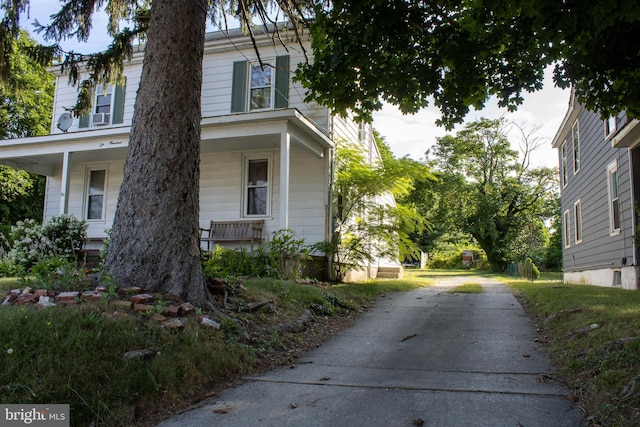 view of home's exterior featuring covered porch