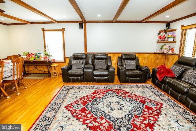 living room featuring hardwood / wood-style flooring and beamed ceiling