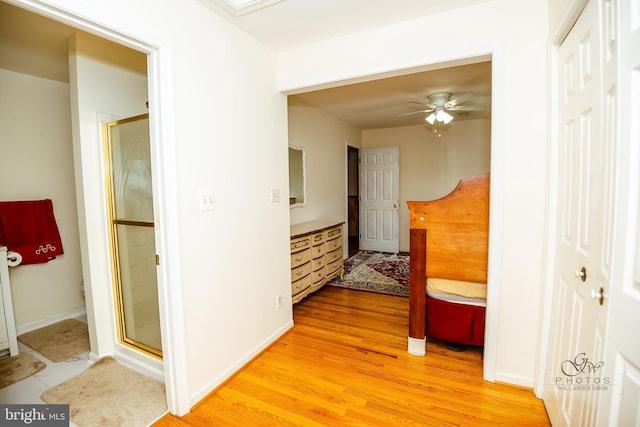 corridor featuring light hardwood / wood-style floors