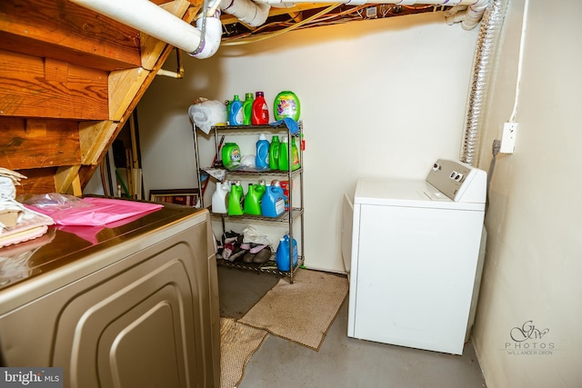 washroom featuring washer and dryer