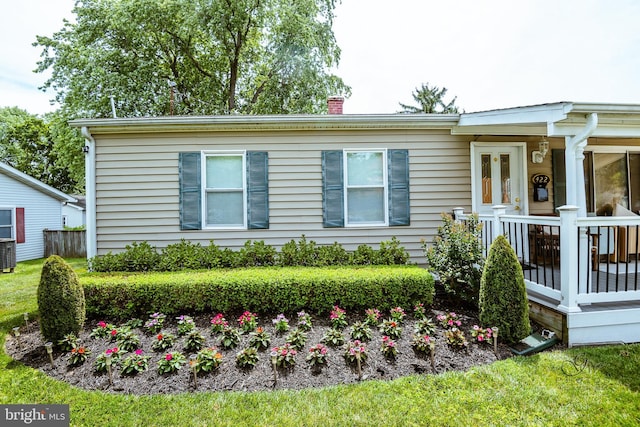 view of front of home featuring central AC unit