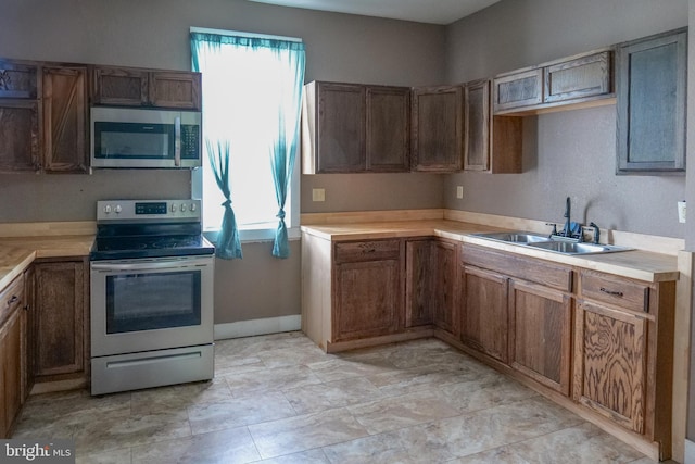 kitchen with sink and stainless steel appliances