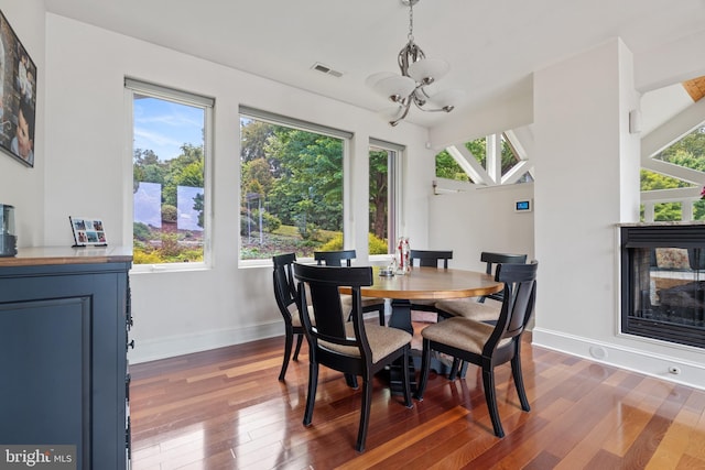 dining area featuring dark hardwood / wood-style floors