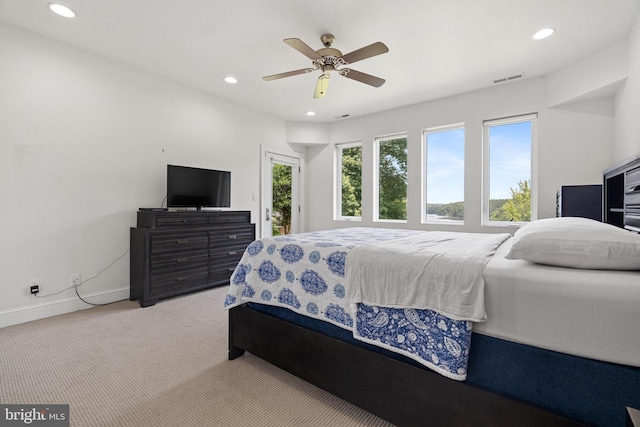 carpeted bedroom featuring ceiling fan