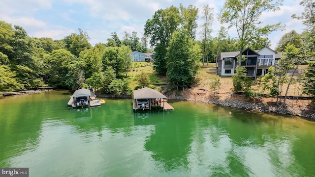 property view of water with a dock