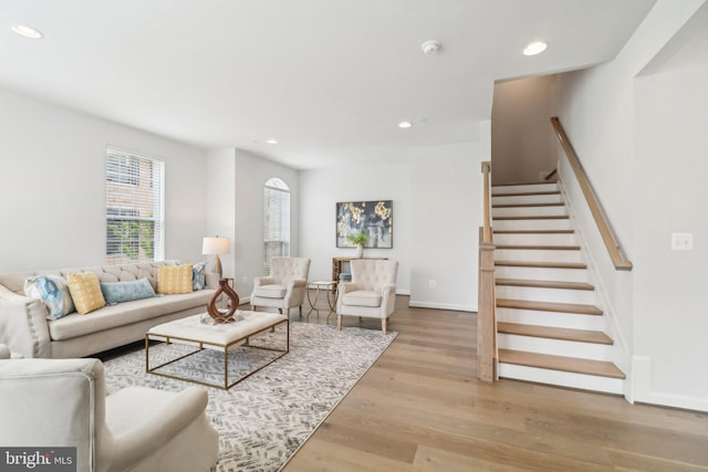 living room with light hardwood / wood-style flooring