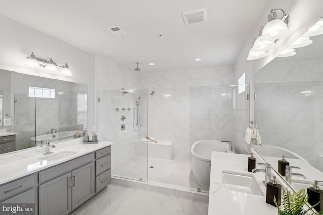 bathroom with vanity, tile walls, and plus walk in shower