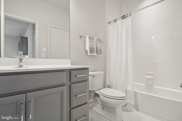 full bathroom with vanity, toilet, and shower / bath combo with shower curtain