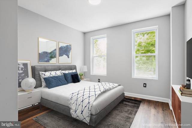 bedroom featuring dark hardwood / wood-style floors