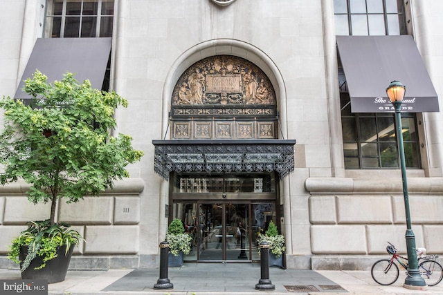 entrance to property featuring french doors