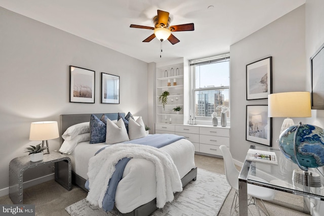 carpeted bedroom with ceiling fan