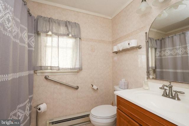 bathroom featuring toilet, tile walls, crown molding, baseboard heating, and vanity