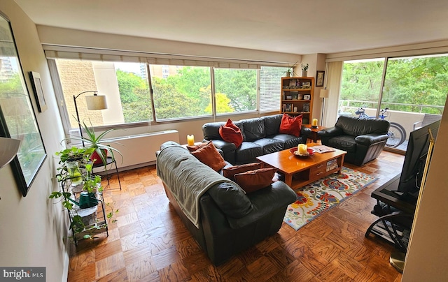 living room featuring light parquet floors