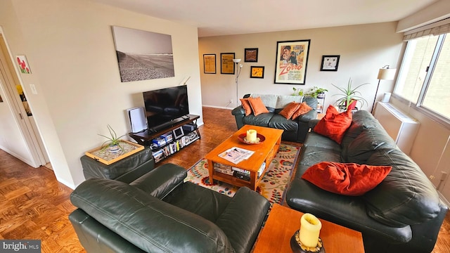 living room with parquet flooring