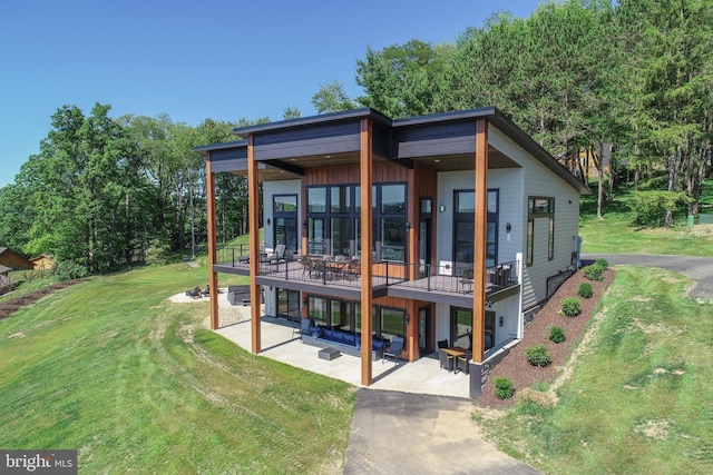 exterior space featuring a patio area and a yard