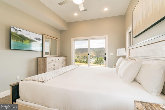 bedroom featuring hardwood / wood-style flooring and ceiling fan