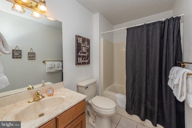 full bathroom with vanity, tile patterned floors, toilet, shower / bathtub combination with curtain, and a textured ceiling