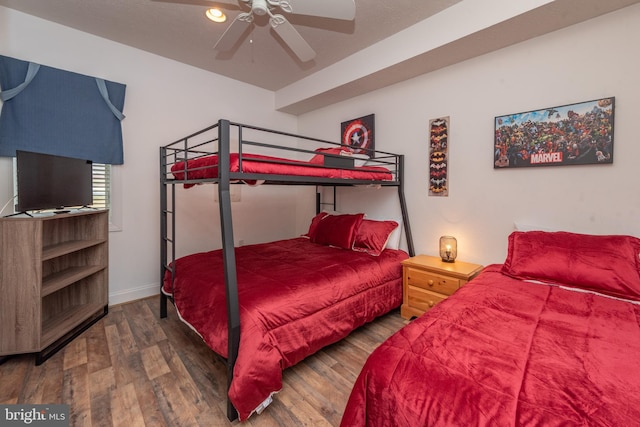 bedroom featuring ceiling fan and hardwood / wood-style flooring