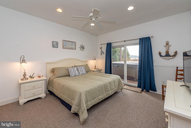 bedroom with ceiling fan, carpet floors, and access to outside