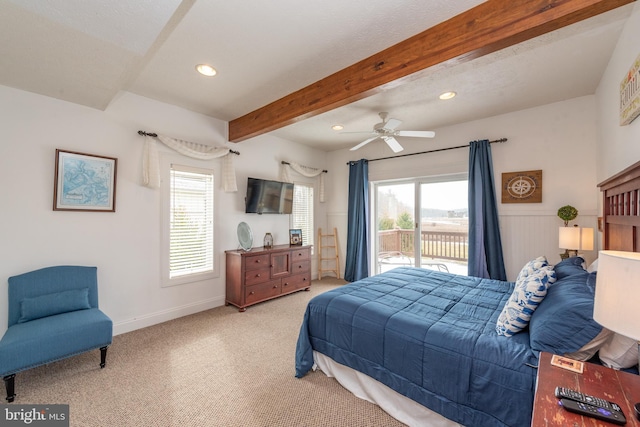 bedroom featuring beam ceiling, access to outside, ceiling fan, and light colored carpet