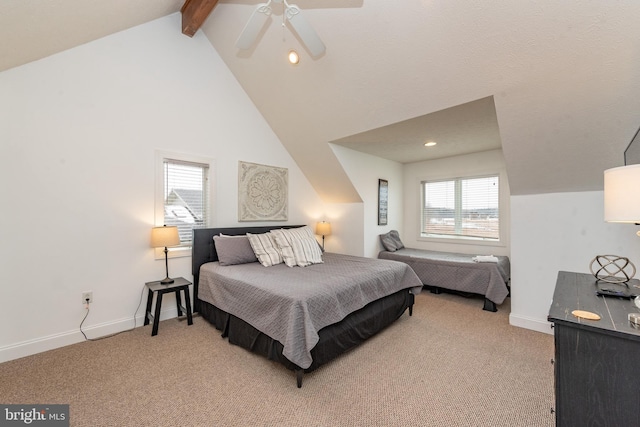 bedroom featuring vaulted ceiling with beams, ceiling fan, light colored carpet, and multiple windows