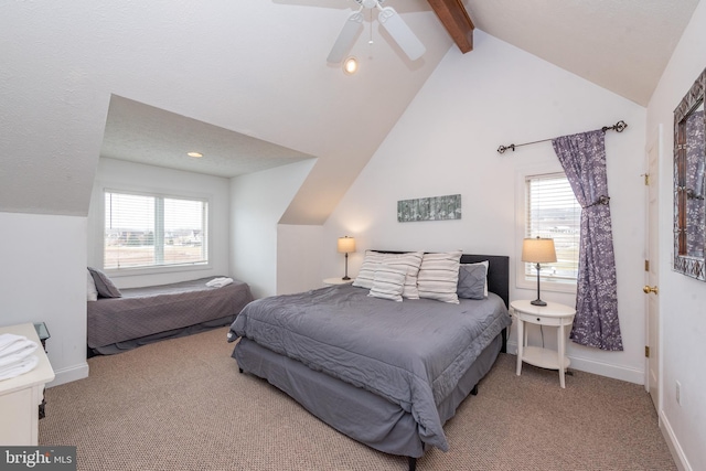 carpeted bedroom with vaulted ceiling with beams and ceiling fan