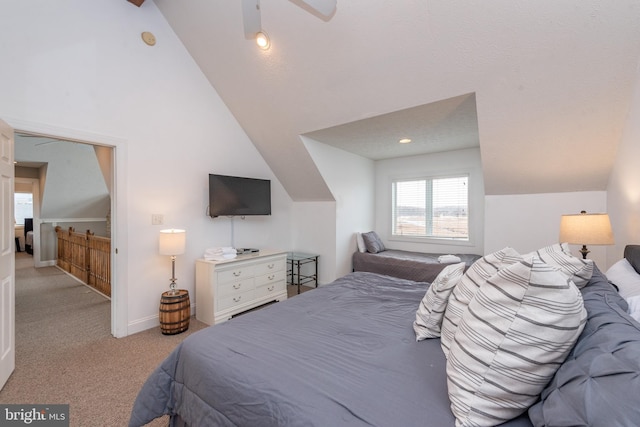 bedroom with light carpet and vaulted ceiling