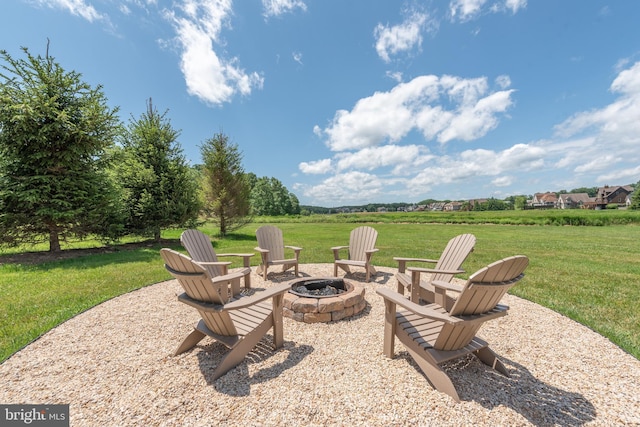 view of patio featuring a fire pit